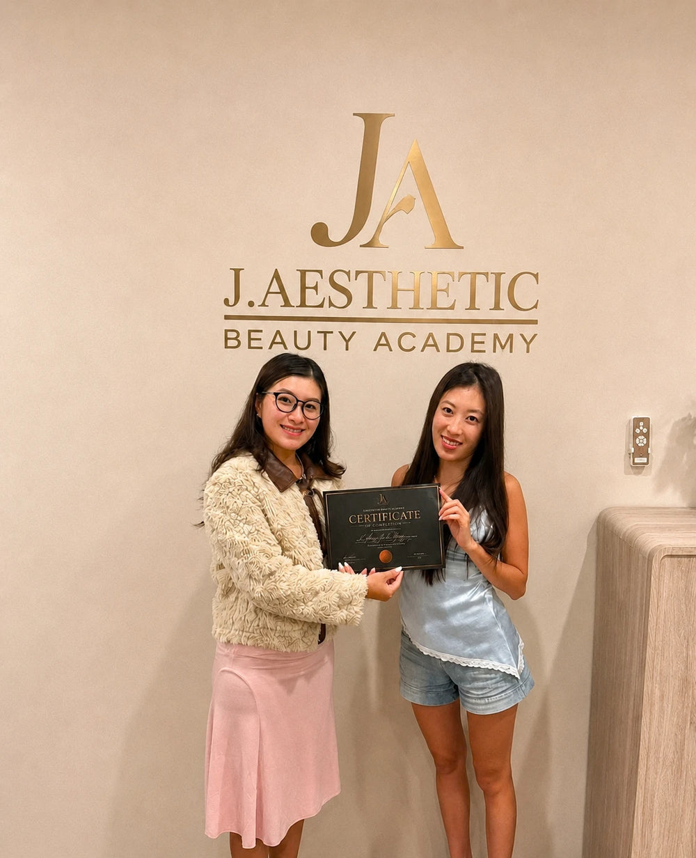 Nail course student receiving a completion certificate at J.Aesthetic Beauty Academy in Sydney