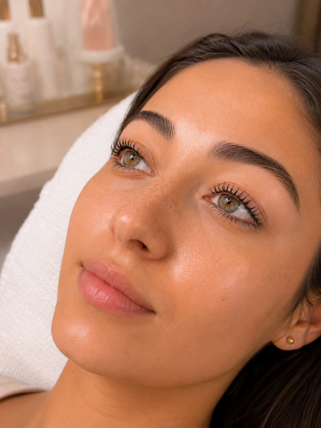 Close-up of natural lifted lashes and groomed eyebrows on a female client near Lane Cove